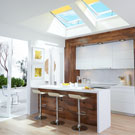 Kitchen with Solar 'Fresh Air' Skylights with solar-powered blinds